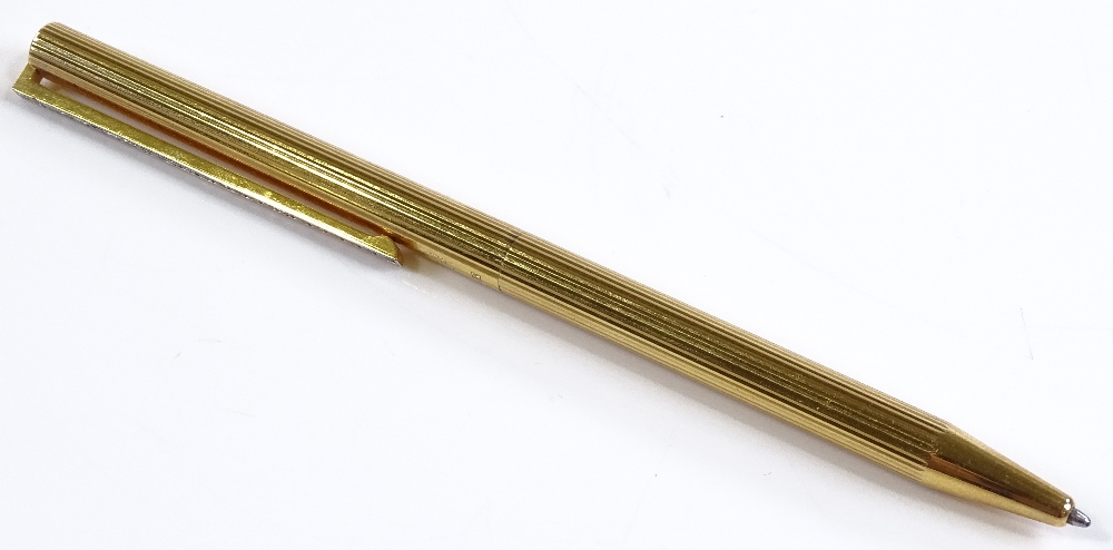 A Dupont gold plated Ballpoint pen with diamond set clip, total diamond content approx 0.5ct - Image 3 of 3