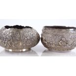 2 small Indian silver bowls, with relief embossed animal and flower decoration, largest diameter
