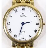 An 18ct gold Omega De Ville Quartz wristwatch, 8 jewel movement with white ceramic dial and brick