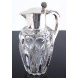 An Edwardian cut-glass and silver-mounted claret jug, engraved floral decoration by Goldsmiths &