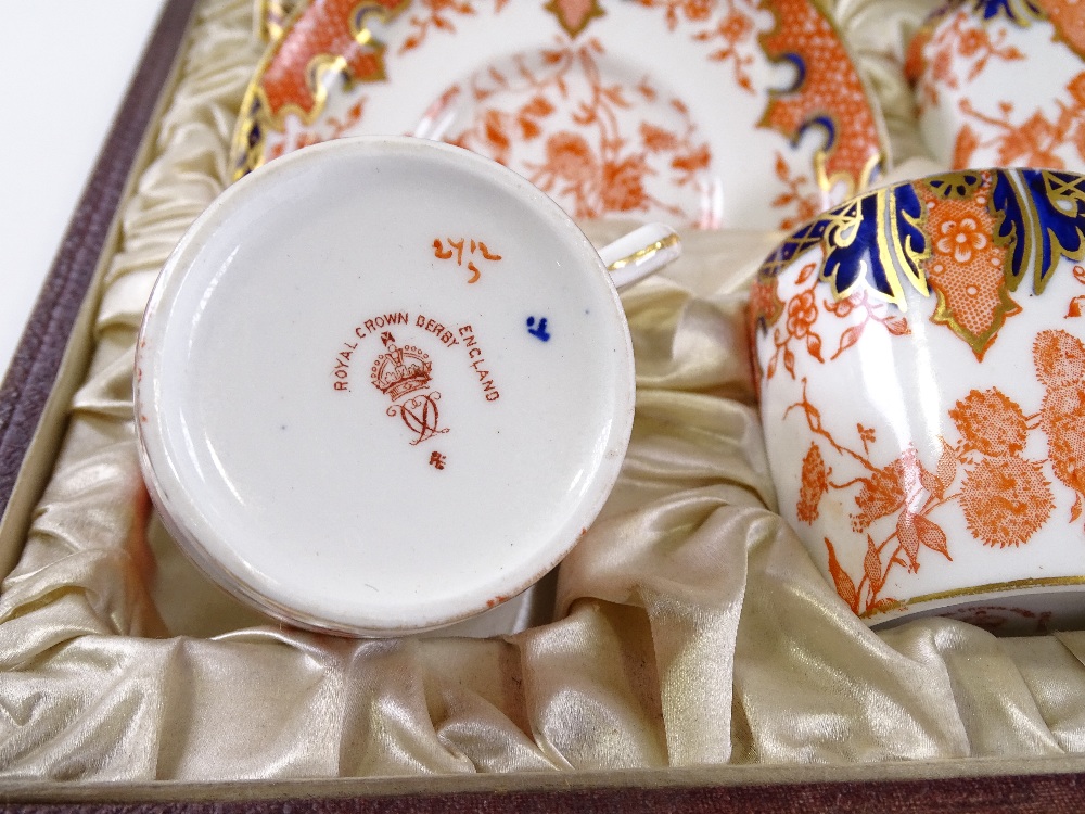 A Royal Crown Derby blue red and gilt decorated coffee service for 6 people, in original leather - Image 3 of 3