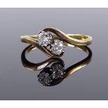 An 18ct gold 2-stone diamond crossover ring, setting height 7.6mm, size M, 2.4g