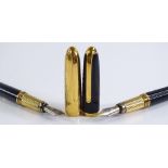 2 Cartier fountain pens, serial numbers 035376 and 1029579, both with 18ct nibs (2)