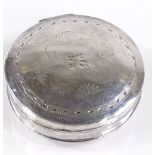 A small circular Dutch silver pillbox, with bright-cut engraving, diameter 5cm