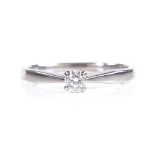 An 18ct white gold solitaire diamond ring, diamond approx 0.15ct, size M, 2.3g
