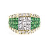 An 18ct gold emerald and diamond cluster ring, set with Princess and round brilliant-cut stones,