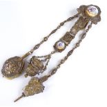 An Antique brass chatelaine, with inset enamel plaques, length 250mm