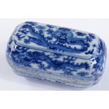 A small Chinese blue and white porcelain box and cover of rectangular form, hand painted dragon