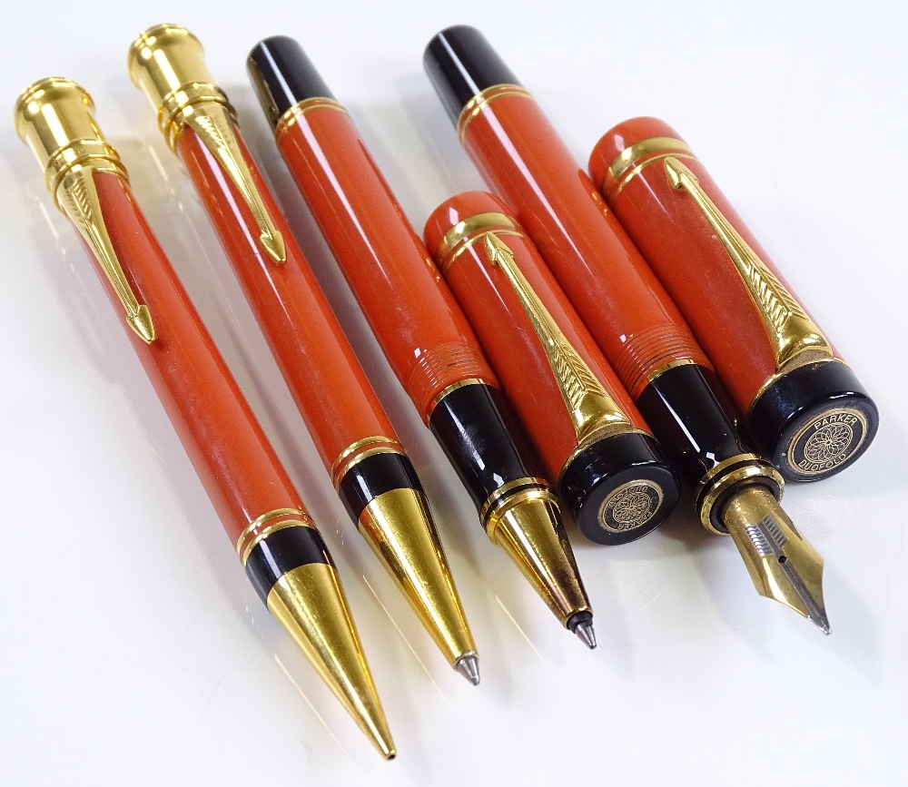 A Parker Duofold Centennial set of pens in orange and black, including fountain pen with 18ct gold - Image 3 of 3