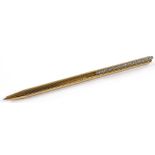 A Dupont gold plated Ballpoint pen with diamond set clip, total diamond content approx 0.5ct