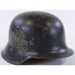 A Second War Period Army tin helmet