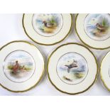 A set of 8 Minton China plates, each with individually hand painted panels, depicting game birds