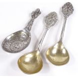 A Continental silver religious spoon, together with a pair of Danish silver spoons with stalk