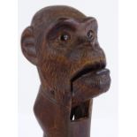 A 19th century Black Forest carved wood monkey design nutcracker, length 19cm