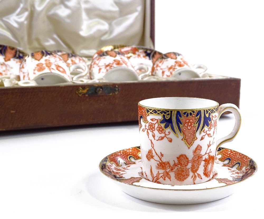 A Royal Crown Derby blue red and gilt decorated coffee service for 6 people, in original leather