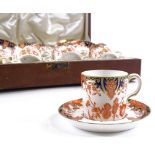 A Royal Crown Derby blue red and gilt decorated coffee service for 6 people, in original leather