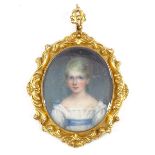 A 19th century unmarked gold pendant, with inset watercolour portrait of a girl, in scrolled foliate