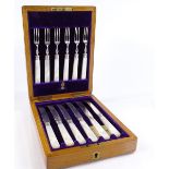 A cased set of silver and mother-of-pearl handled fruit knives and forks, by Barker Brothers,