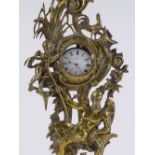An ornate 19th century brass pocket watch stand, supported by a figure of Old Father Time,