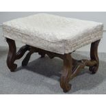An 18th / 19th century Continental walnut-framed stool, on shaped supports