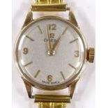 A lady's 9ct gold Omega Mechanical wristwatch, 17 jewel movement with gate link strap, calibre