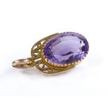 An oval-cut amethyst pendant, in 9ct gold frame, maker's marks AS, height 28.1mm, 6.4g