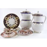 A group of 19th century Derby china, including a graduated pair of blue and gilt lidded jugs,