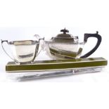 An Art Deco style 2-piece silver tea set, maker's marks Harrison Brothers & Howson, hallmarks