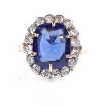 An unmarked gold synthetic sapphire and diamond cluster ring, setting height 16.8mm, size L, 5.3g