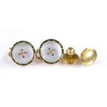 A cased set of Goldsmiths & Silversmiths dress studs, including 15ct gold green enamel and mother-