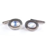 A pair of silver and cabochon moonstone cufflinks, panel length 18.7mm, 6g