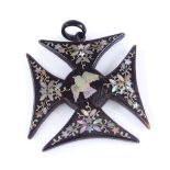 A Maltese cross design mother-of-pearl inlaid papier mache pendant, with bird and flower decoration,