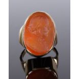 A 9ct gold carnelian intaglio ring, with carved portrait of Shakespeare, setting height 24.7mm, size