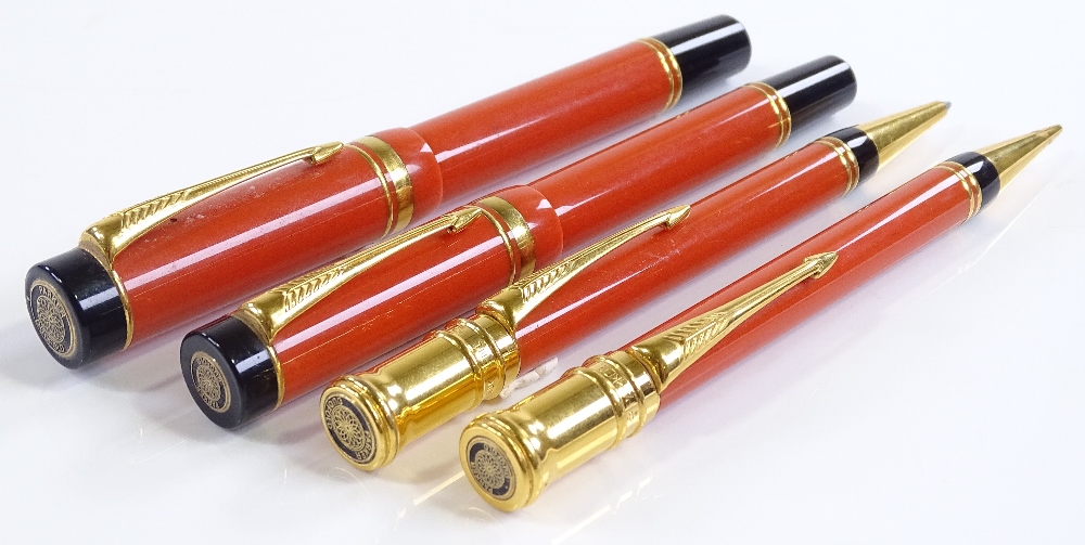 A Parker Duofold Centennial set of pens in orange and black, including fountain pen with 18ct gold - Image 2 of 3