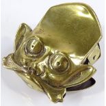 A Victorian brass gnome design desk paperclip, length 6cm