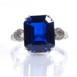 A platinum 3-stone blue spinel and diamond ring, setting height 12.1mm, size O, 6.1g