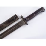 A 19th / 20th century Continental bayonet with scabbard