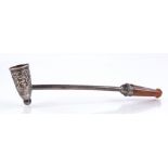 An Edwardian silver novelty pipe, with embossed floral bowl and amber mouthpiece, by Henry