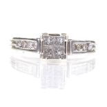 A 9ct white gold diamond cluster ring, Princess and round-cut diamonds approx 0.3ct total, setting