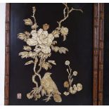 A pair of Chinese lacquer panels, with applied carved bone bird and floral decoration, carved wood