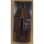 An abstract relief metal sculpture, circa 1970s, unsigned on hessian background, overall