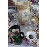 A Victorian wash jug, a Royal Doulton Toby jug, cut-glass decanters etc