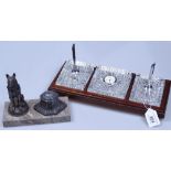 A spelter dog figure desk stand, length 6.5", and a Watford Crystal desk stand