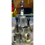 8 bells with turned wood handles, largest 11"