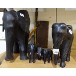 A carved and painted wooden elephant, height 10.5", and 4 other elephants