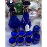 A blue glass decanter set