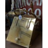 An Art Deco design brass coal box with shovel