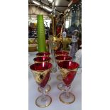 A Gilded ruby glass decanter set, and 2 glass vases