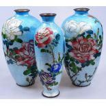 A pair of cloisonne vases, height 10" (A/F), and another