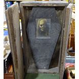 A Gothic panel in coffin style frame, height 24.5"